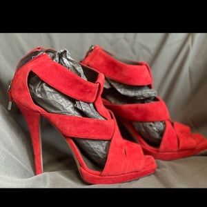 Red Suede Halston 4 1/2 inch heels worn once on stage in a runway show.